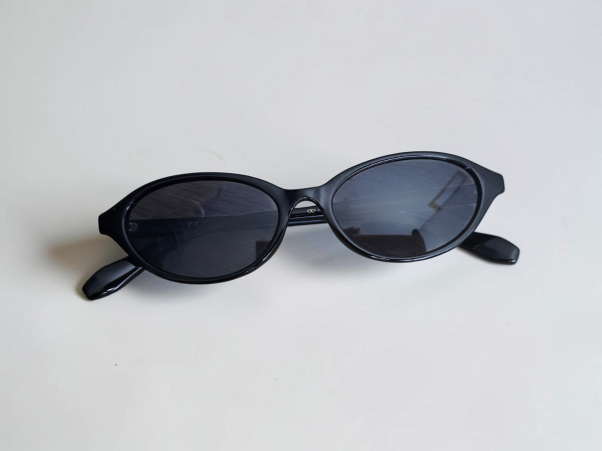 Meller Tutcar Gloss Black Oval Sunglasses – Polarised CAT.3