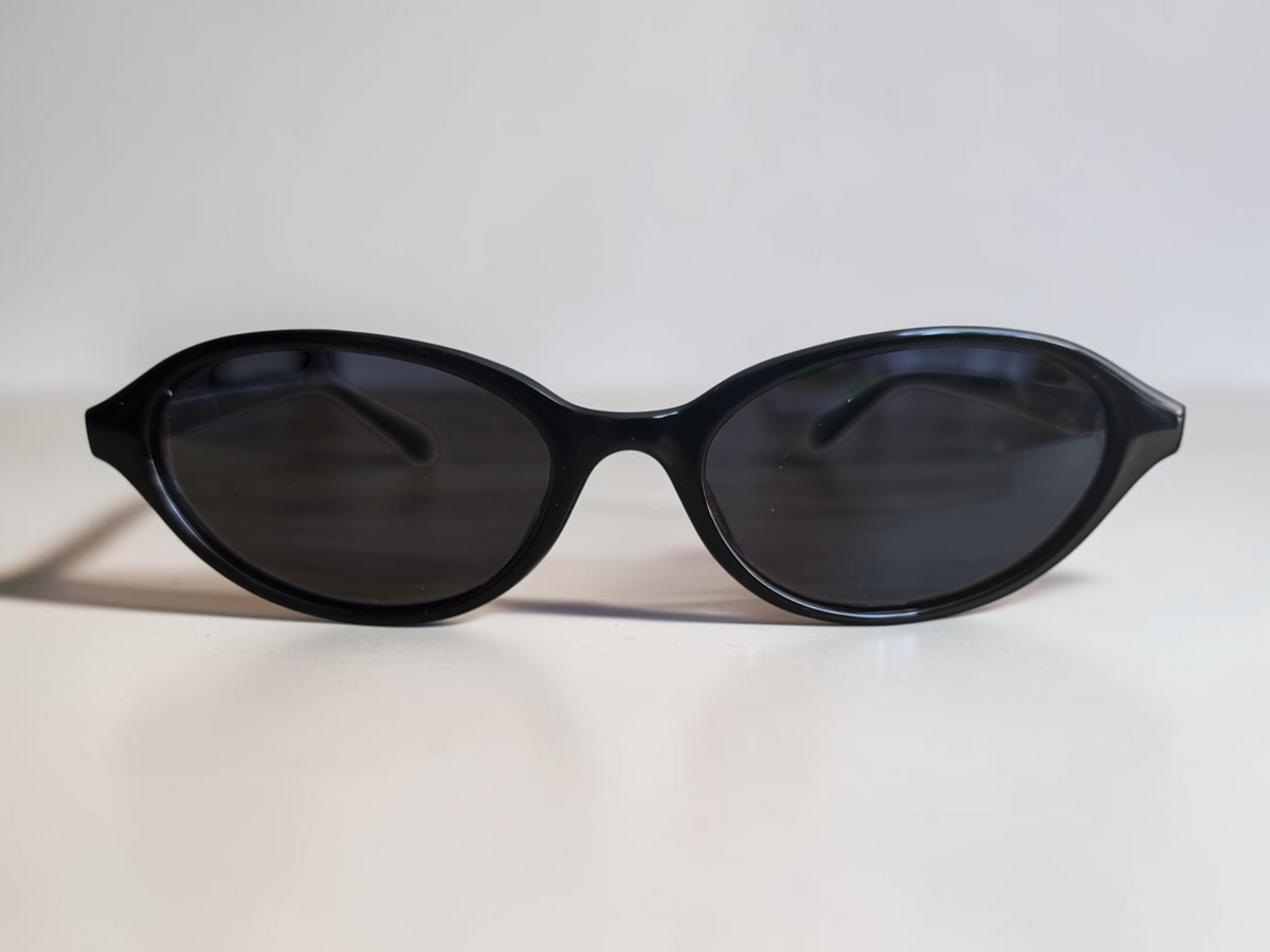 Meller Tutcar Gloss Black Oval Sunglasses – Polarised CAT.3