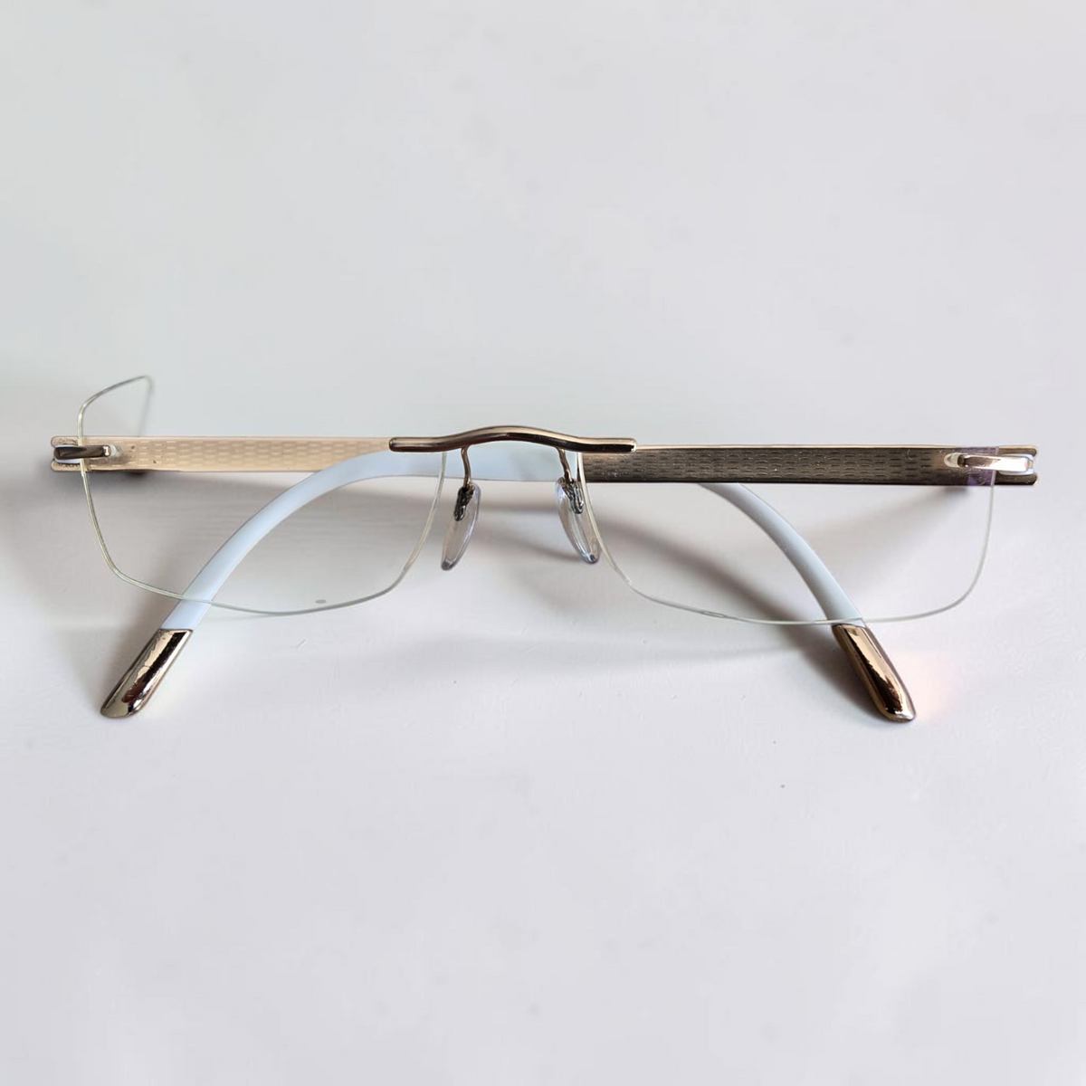 Silhouette Rimless Glasses Rose Gold White Titanium Minimal